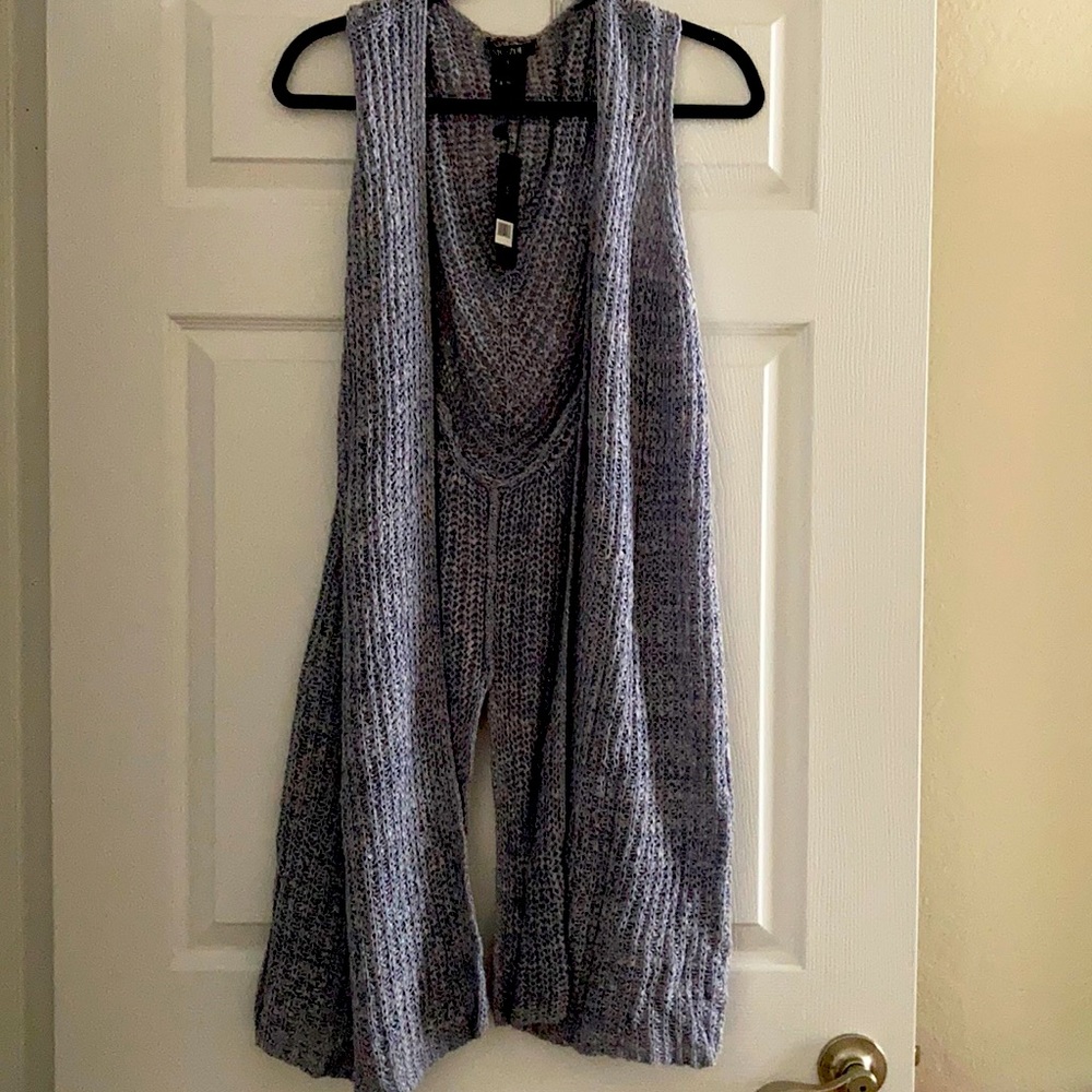 Sleeveless knee length spring sweater